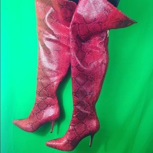 Knee high snake boots🥳
